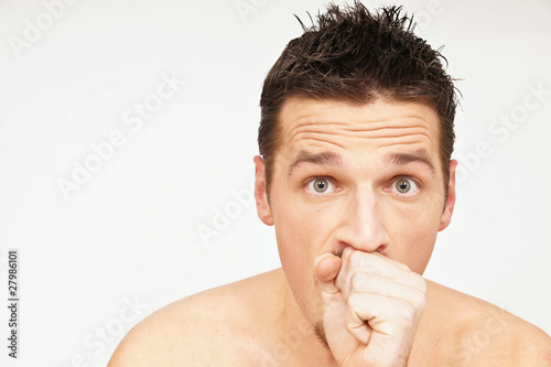 Young man has a cough. You can write text on left side.