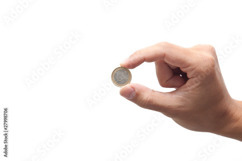 Male hand holding an euro coin