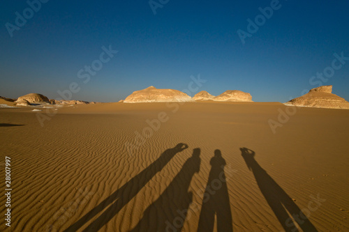 Human shadows in the desert