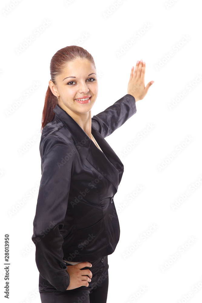 Happy young woman pointing upwards Happy young woman pointing upwards