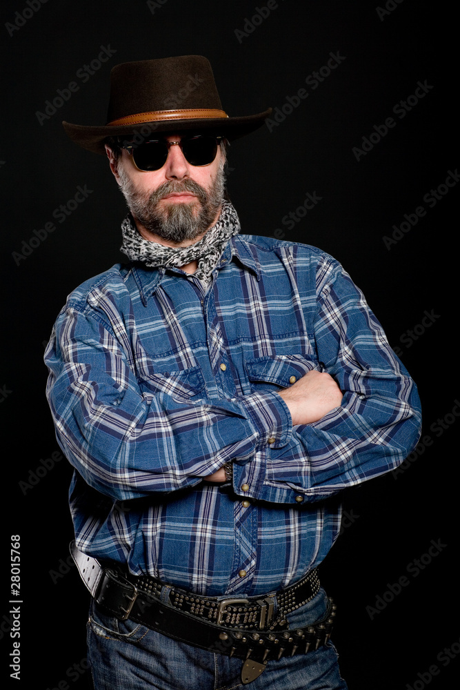 Middle aged man in a cowboy hat. Middle aged man in a cowboy hat.