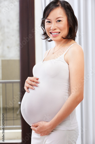 Pregnant lady caress her stomach Free Download Pregnant lady caress her stomach - GFXLoad