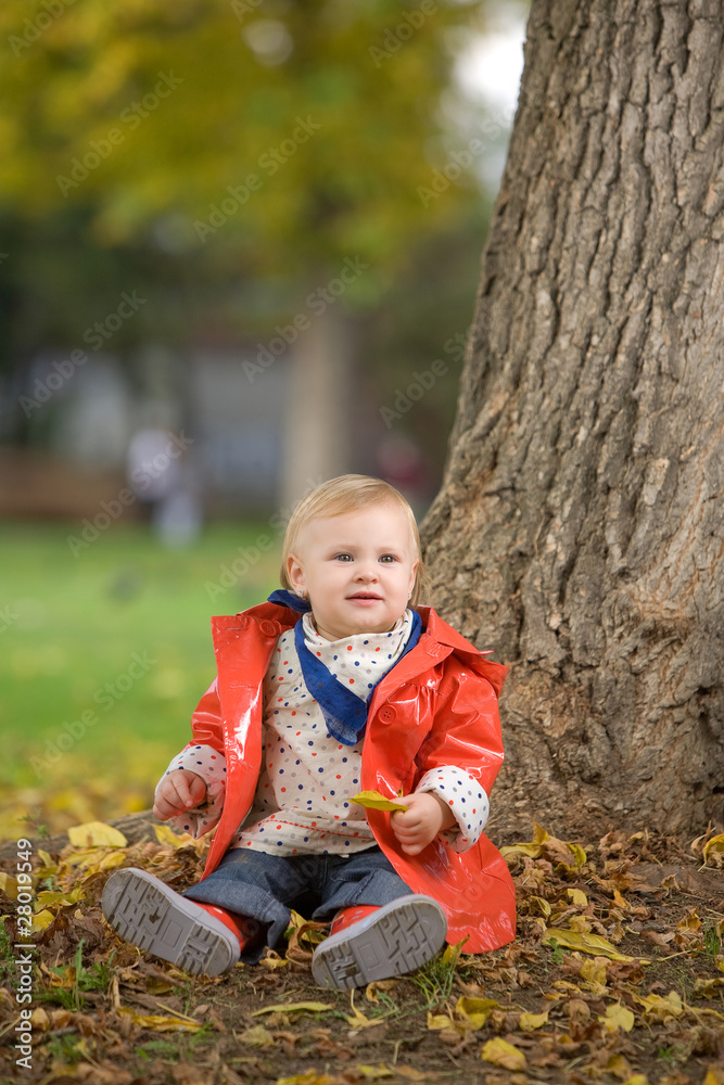 Little girl playing in the park Little girl playing in the park