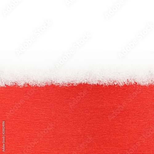Fond rouge brillant et neige en poudre