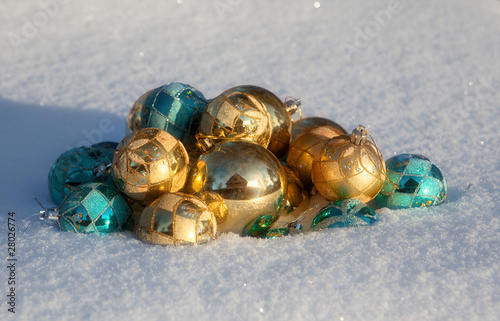 Fur-tree toys lie on snow