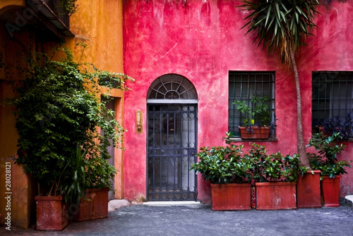 Facade of a colorful house in Rome (Italy) © psakis
