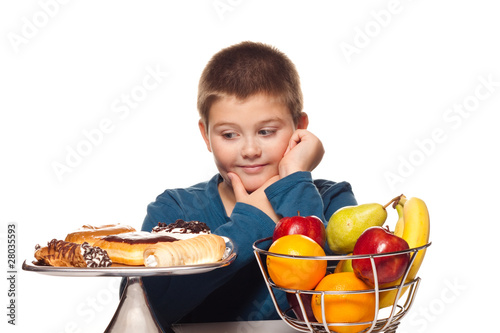 a boy's choice of a healthy or unhealthy snack
