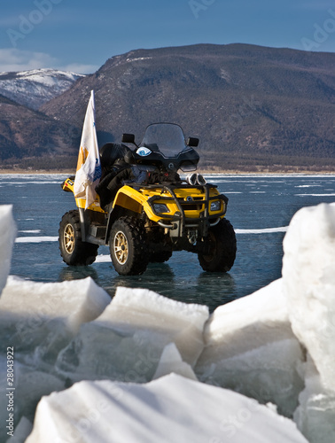 all-terrain vehicle On an ice of Baikal