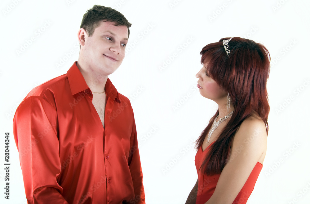 Naklejka premium Young couple in red has fallen out