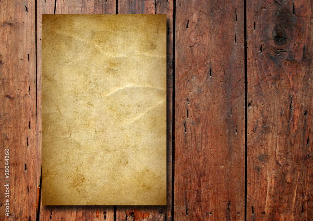 Old paper over an old wood background Old paper over an old wood background
