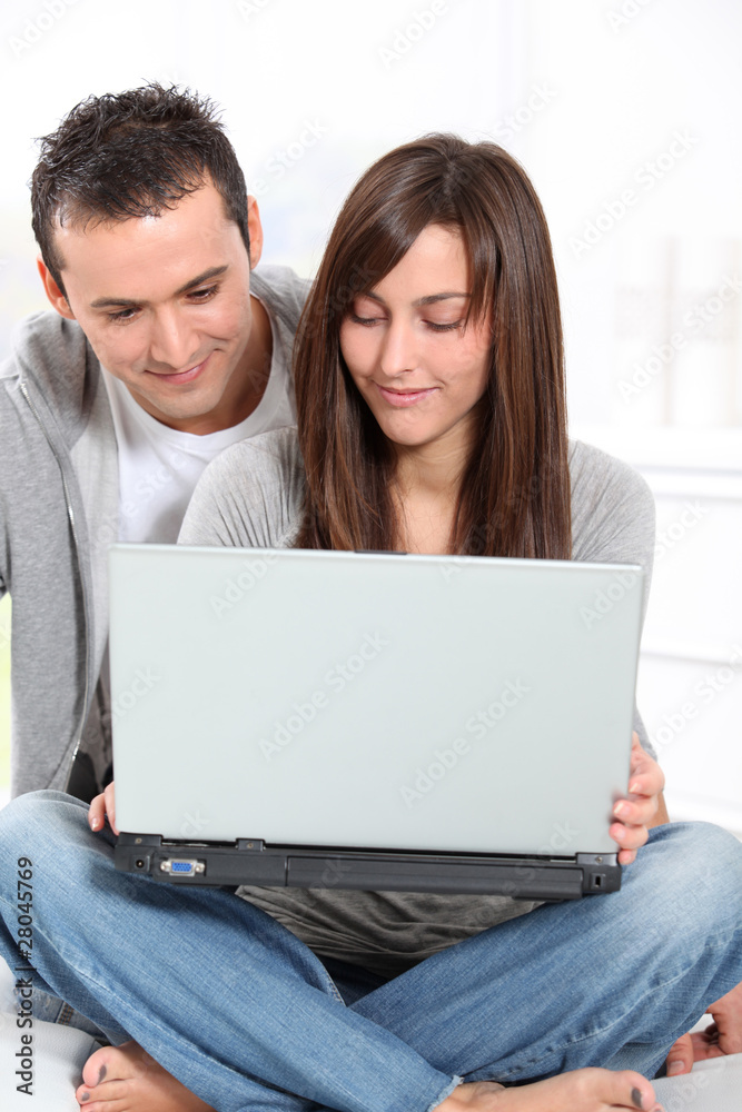 Young couple surfing on internet