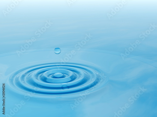Conceptual blue water drop falling background