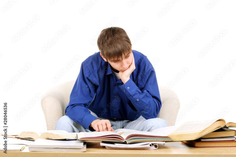 teenager studying hard for the exam teenager studying hard for the exam