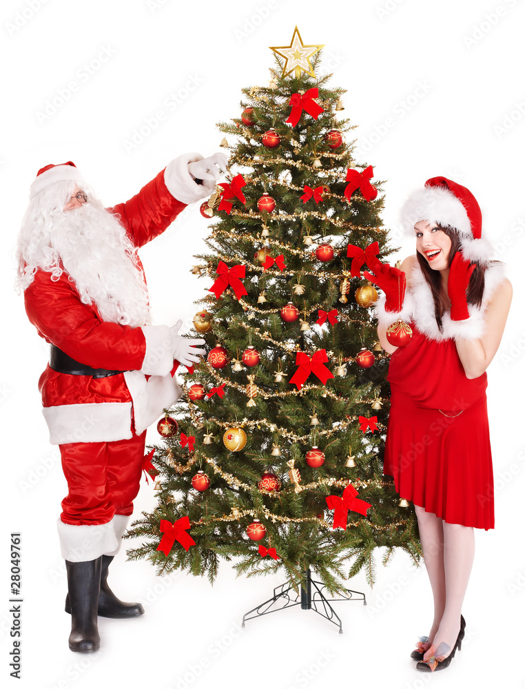 Girl and santa clause by christmas tree. Isolated. Girl and santa clause by christmas tree. Isolated.