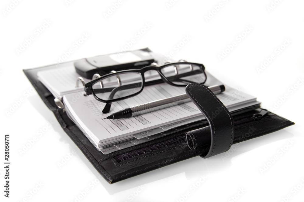 Terminkalender mit Handy, Brille und Stift Terminkalender mit Handy, Brille und Stift