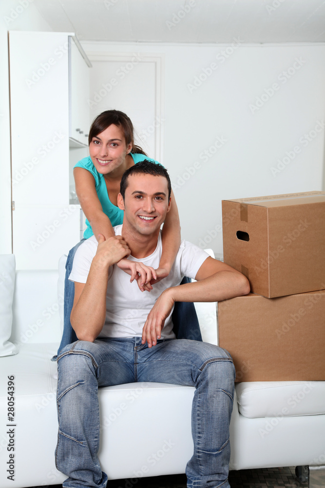 Young couple moving in new place Young couple moving in new place
