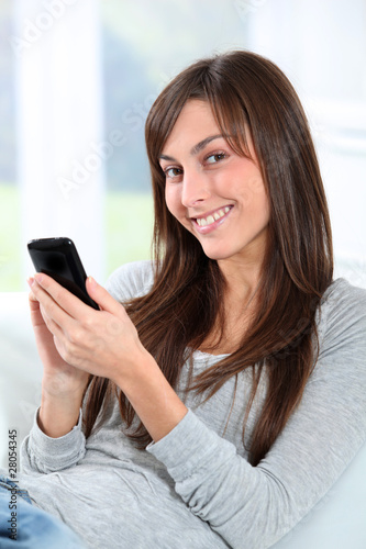 Beautiful young woman talking on mobile phone