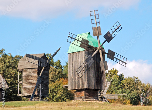 Vászonkép Antique ramshackle wooden windmill, Pirogovo, Kiev, Ukraine