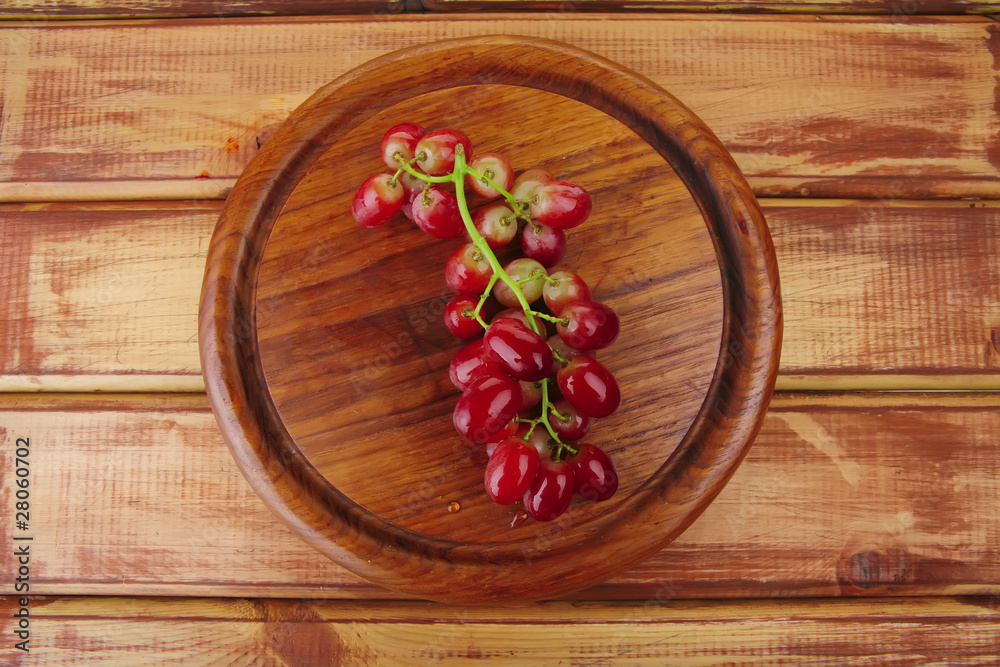 red grape on wood red grape on wood