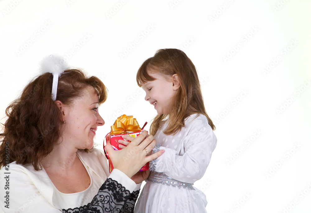 Mother with daughter and christmas toys