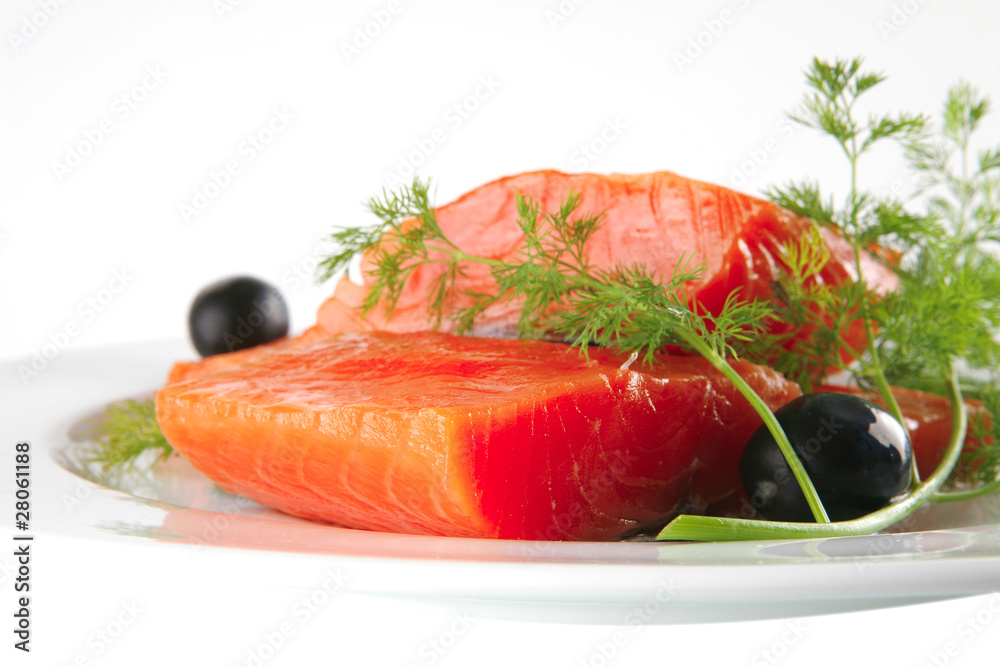 smoked salmon on white plate with olives smoked salmon on white plate with olives
