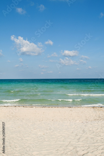 Sand beach on the bright summer day © Elnur