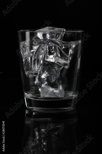 Glasses with ice on a black background