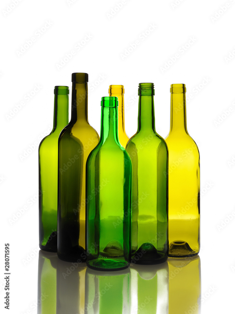 Many empty green wine bottles isolated on white background