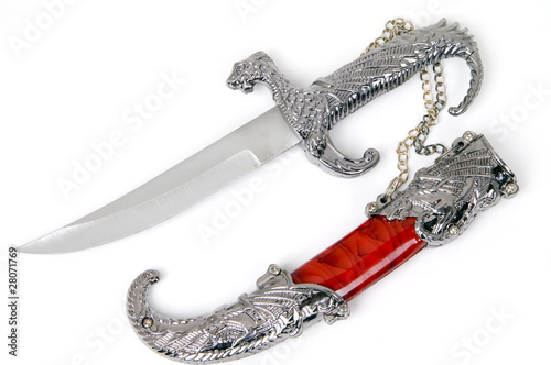 Souvenir dagger and scabbard on a white background