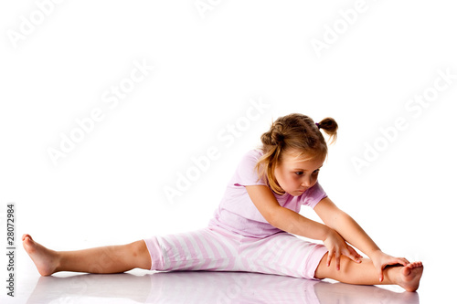 Beautiful girl exercising, stretching