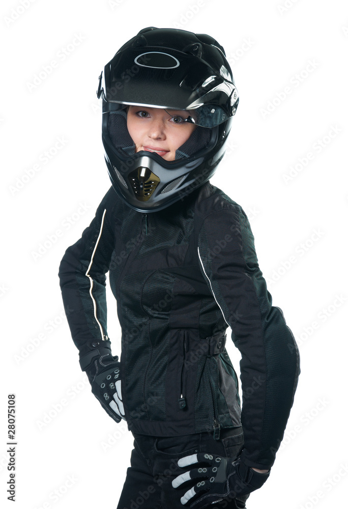 Young beauty woman posing in motorcycle clothing and helmet