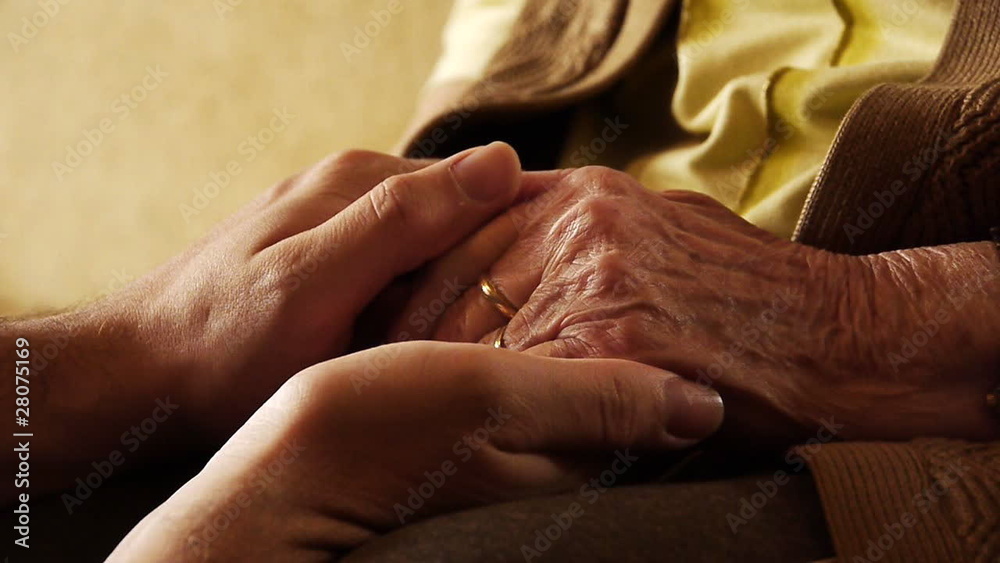 Senior old woman young man hold hand wrinkle skin close up 2