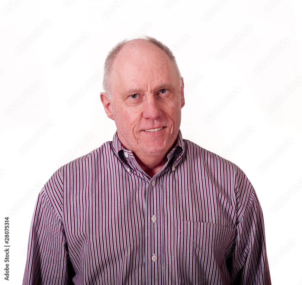 Older Bald Man in Striped Shirt Smiling Head to Side Older Bald Man in Striped Shirt Smiling Head to Side