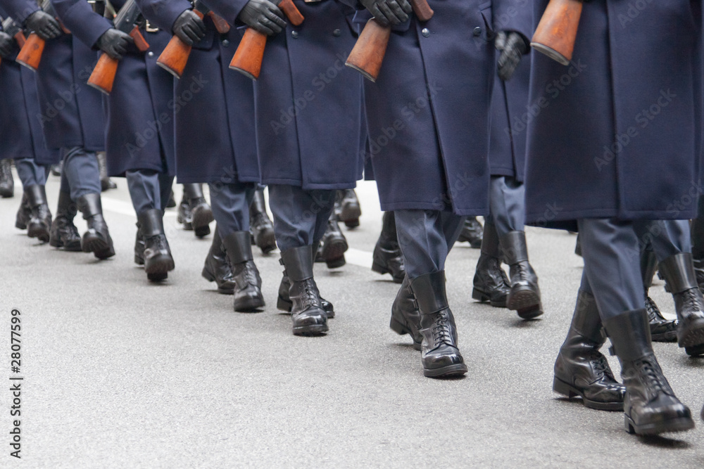 Soldiers marching in a row