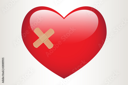 Red heart with adhesive plaster