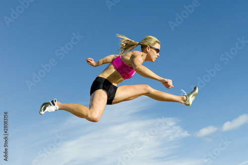 фотографія Athlete Jumping Against a Sky Backdrop