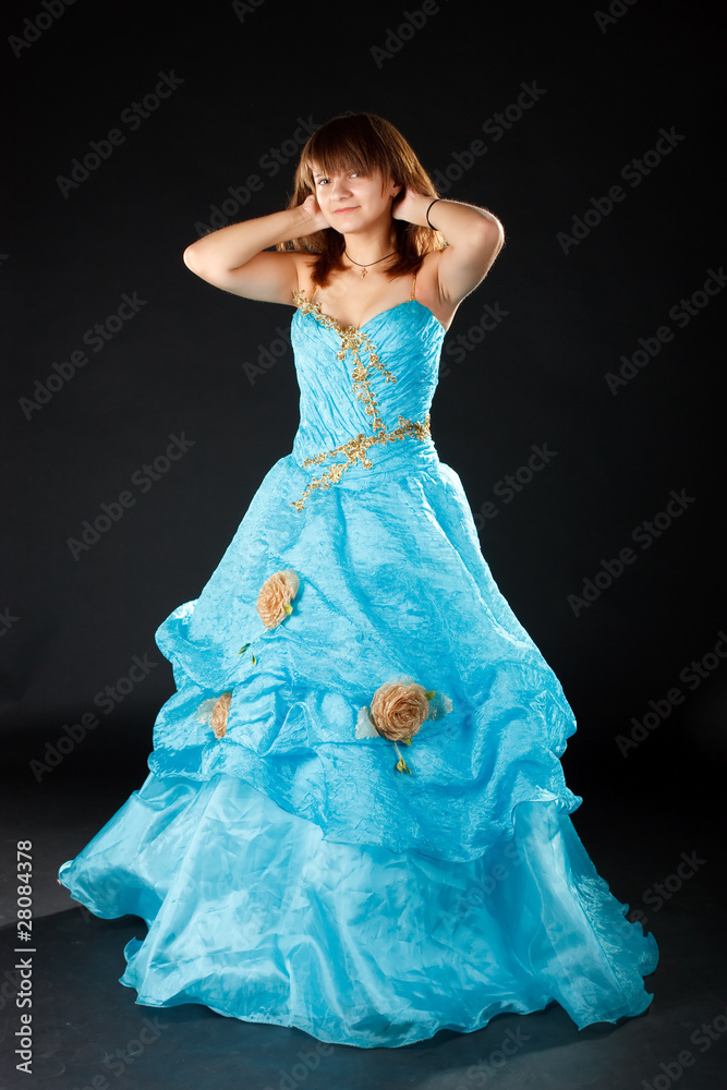 Fototapeta premium The girl in the long blue dress