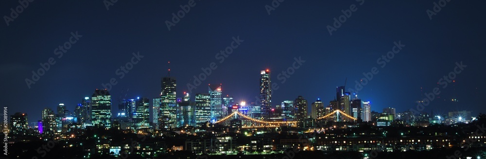 Fototapeta premium Brisbane City, Australia at Night With Storey Bridge