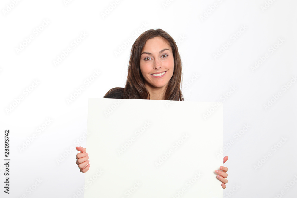 Woman in black dress showing message on white board Woman in black dress showing message on white board