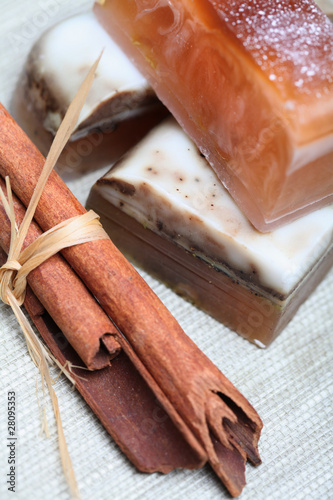 Handmade soap and sinnamon sticks photo