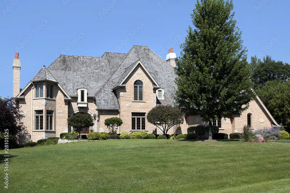 Large home with cedar shake roof