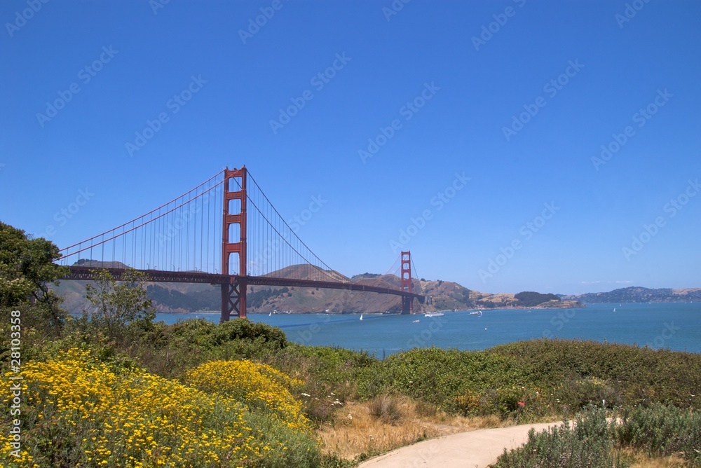 Golden Gate Bridge with Golden Gate Promenade in summer Golden Gate Bridge with Golden Gate Promenade in summer