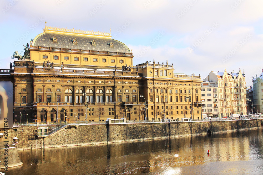 First Snow in Prague, national Theatre in the sunny Day