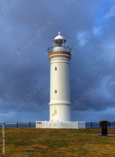 lighthouse against dramatic sky