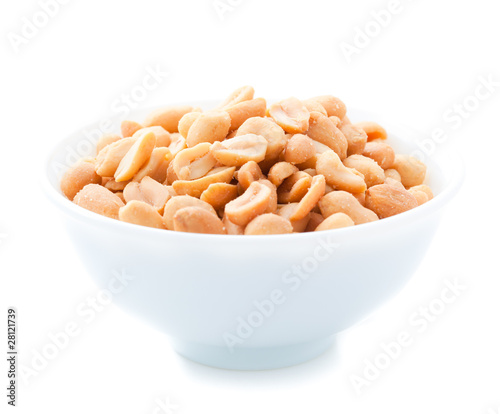 Roasted Peanuts in white plate isolated