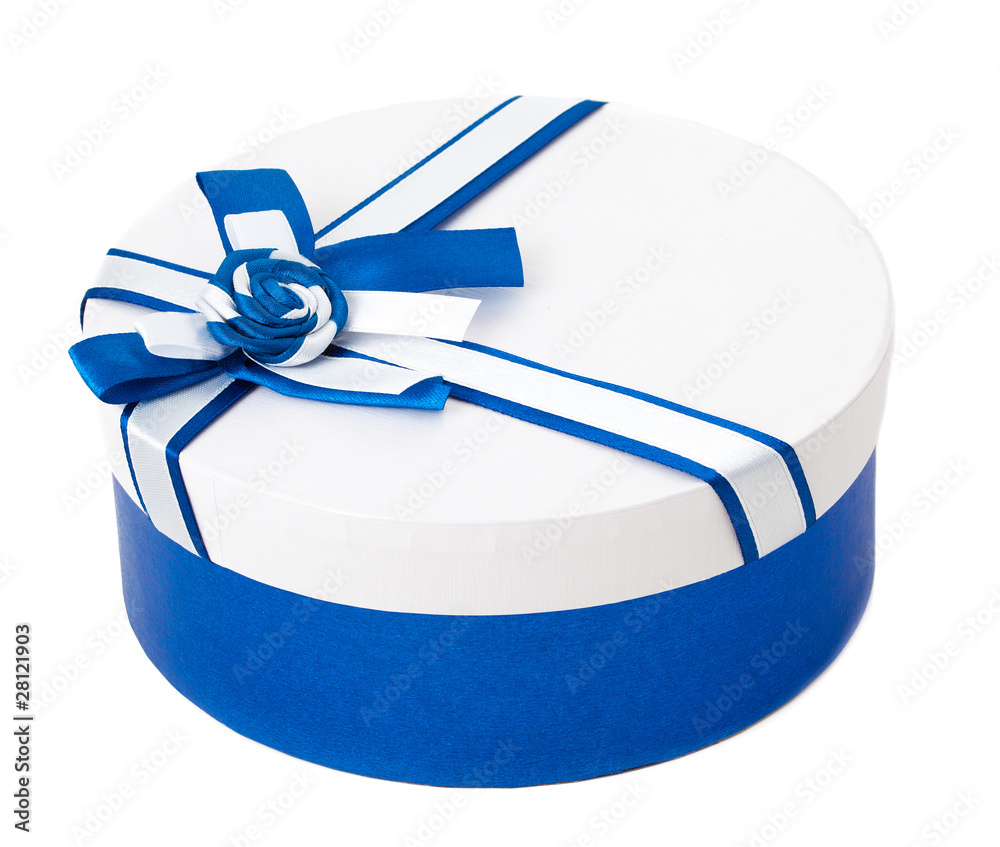 Round shape gift box with blue ribbon and bow isolated Round shape gift box with blue ribbon and bow isolated