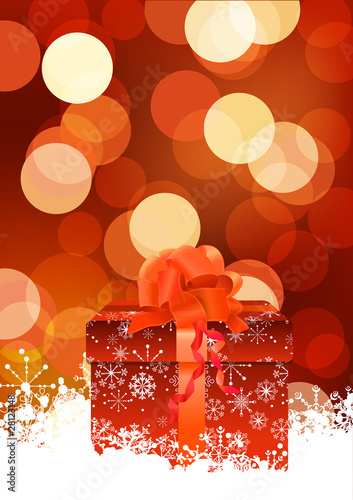 Defocused sparkle christmas background with gift box