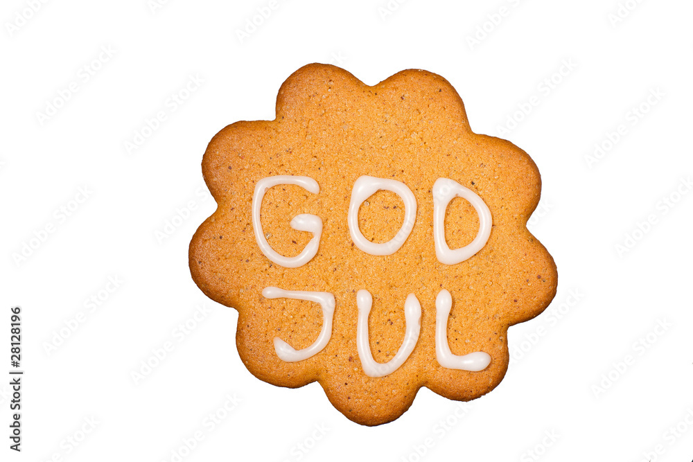 Gingerbread biscuit with text God Jul, isolated on white Gingerbread biscuit with text God Jul, isolated on white