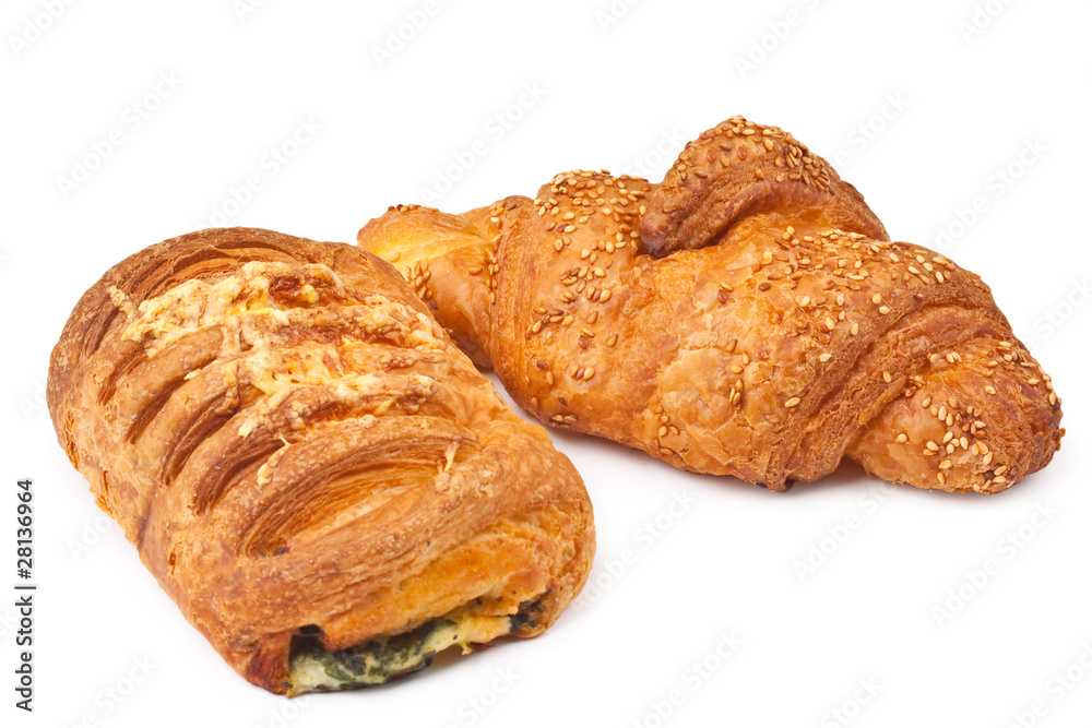 Croissant with sesame seeds and bun with cheese and spinach Croissant with sesame seeds and bun with cheese and spinach