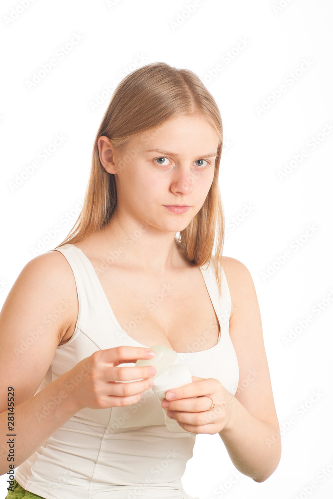 portrait of young woman closing deodorant portrait of young woman closing deodorant